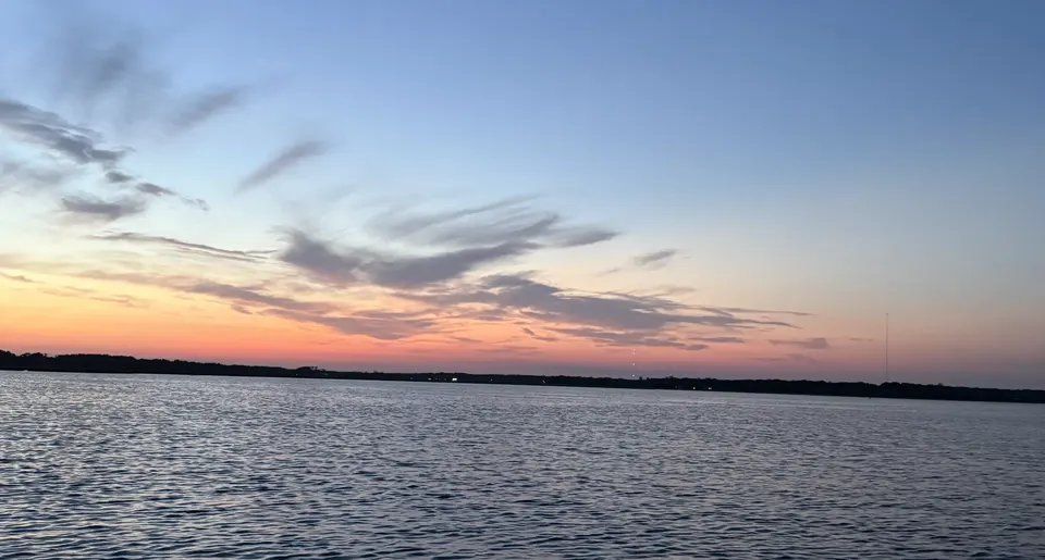 Pink and blue evening sky over the Sapelo River after sunset in coastal Georgia.